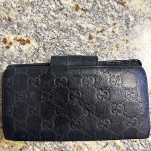 Vintage Gucci black leather monogram wallet
